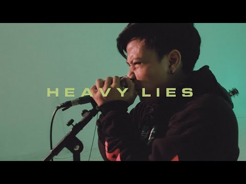 DIVIDE - Heavy Lies (Feat. Tuan Tigabelas)