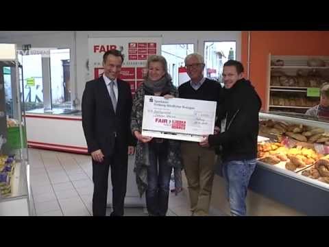 Riether überreicht Spende für die Tafel