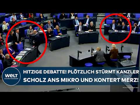 BUNDESTAG: Hitzige Debatte! Plötzlich stürmt Kanzler Olaf Scholz zum Mikro - und kontert Merz