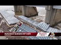 Several barges loose hit dam on Ohio River, 1 carrying methanol is sinking