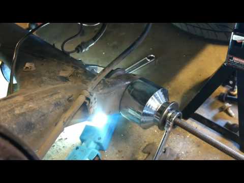 Removing and installing VW rear beam bushings with home tools.
