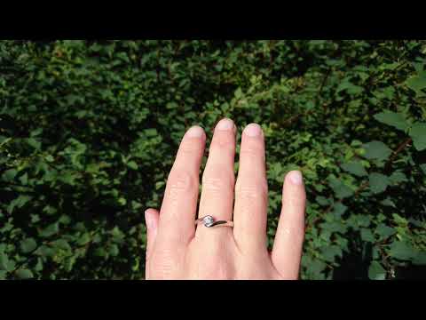 9ct white gold diamond crossover solitaire ring