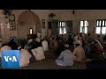 Worshippers Attend Prayers In Flood Ravaged Pakistan