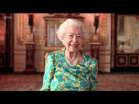 The Queen with Paddington Bear and "We Will Rock You" by Queen with Adam Lambert