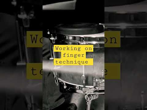 practicing finger technique for drums. build weak hand by practicing it more. simple.