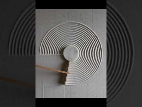 Satisfying japanese zen garden sand raking