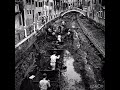 World History- Canal being cleaned in Venice, Italy, 1956.