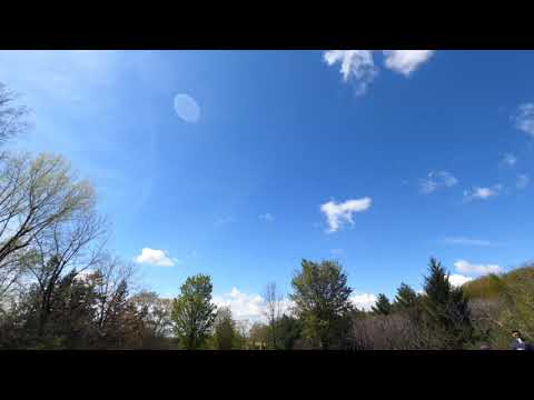 Floating clouds in a blue sky-4K