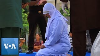 Indonesia: Woman Collapses After Being Caned for P