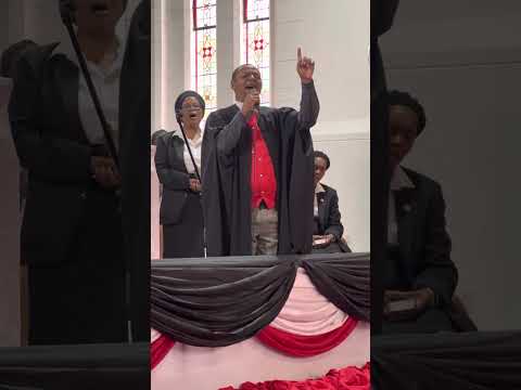 Rev Mantini worshiping