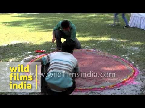 Indian men draw 'rangoli' - Parmarth Niketan Ashram, Rishikesh