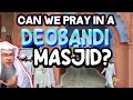 Can we pray in an intolerant Deobandi Masjid, passing in front of others while they are praying?