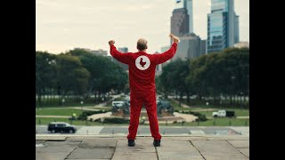 Zaxby's Man approaches a group of workers