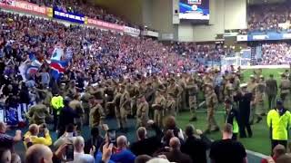 GLASGOW RANGERS FANS SINGING FATHERS ADVICE AND DOING THE BOUNCY WITH BRITISH SOLDIERS
