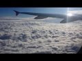 Airplane Taking Off Ascending Above The Clouds