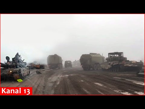 Road filled with destroyed Russian equipment - T-90M and T-80BVM tanks, armored vehicles, and trucks