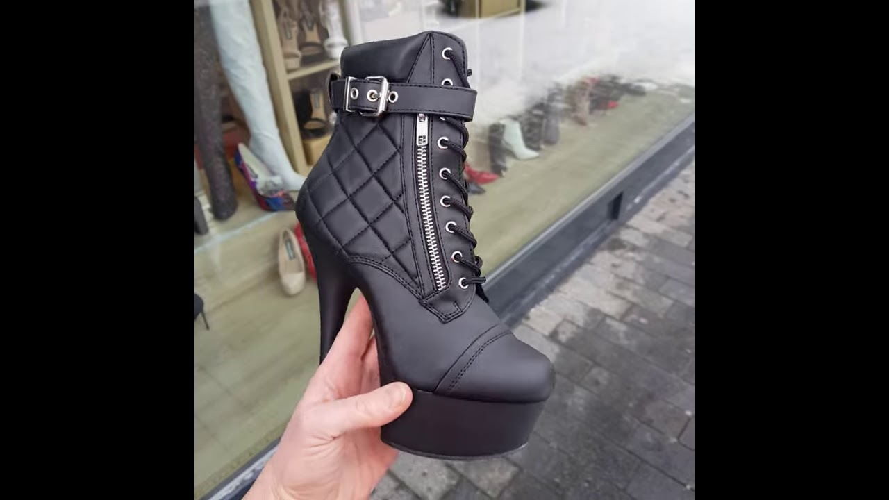 Stoere zwarte boots met zilveren rits en gesp (artikel 2328.10.057)