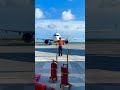 How do pilots park their plane? - Man marshalling plane