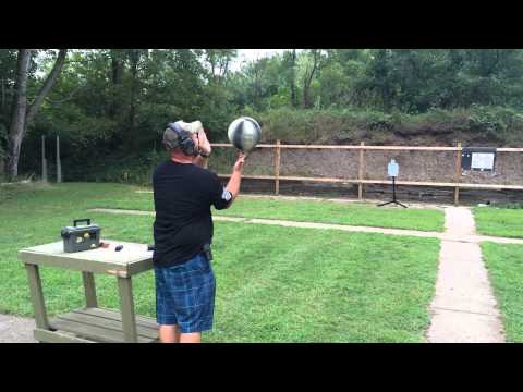 Spinning a basketball. And shooting a Glock 17.