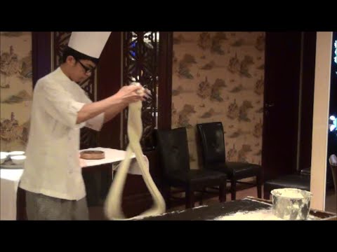 Chinese Chef Makes Noodles by Hand. Hand Pulled Noodles. Hong Kong Food