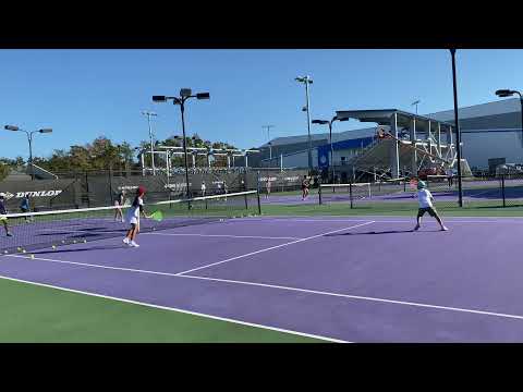 IMG Academy ethan hits a forehand to win the point with lauren