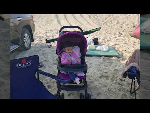 me and my sister was having fun in the  beach with our parents and my friends