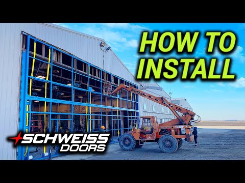 How to Install a Strap Bifold Hangar Door on Welding Shop