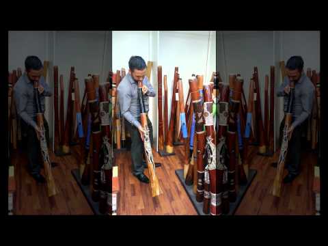 Aboriginal Artist and Didgeridoo Maker Allan McKenzie playing a didgeridoo F