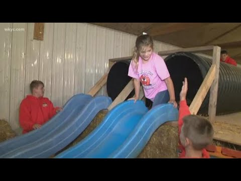 Exploring the indoor hay maze at Kingsway Pumpkin Farm
