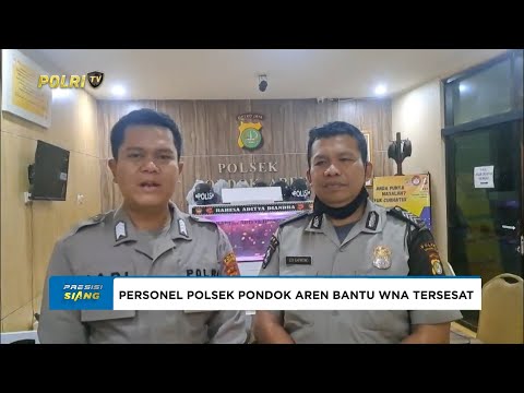 PERSONEL POLSEK PONDOK AREN BANTU WNA KAMBOJA YANG KEBINGUNGAN DI STASIUN TANAH ABANG