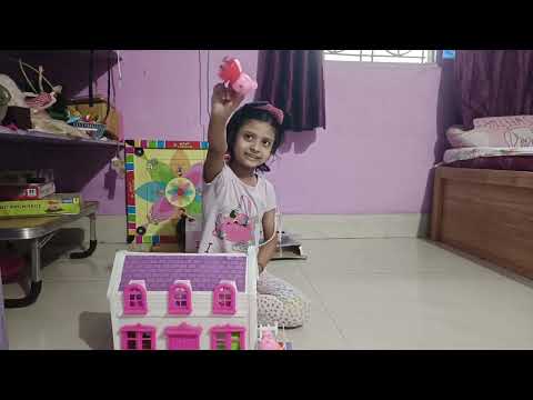 miska pauravi playing with doll house