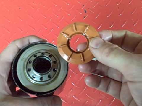 Motorcycle Repair: Inside a Harley Davidson Oil Filter and a Fram Oil Filter