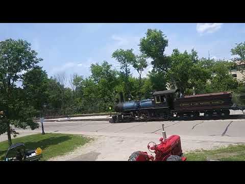 Baldwin engine 7 passes a railroad crossing near Smith Creek Station at Greenfield Village, Dearborn