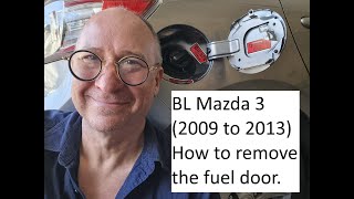 BL Mazda 3 (2009 to 2013): How to remove the fuel door (flap).