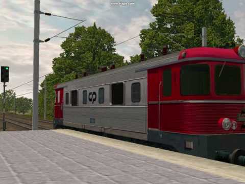 Partida de um comboio de Areia com  duas locs  2550