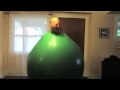 Man inside green ball 