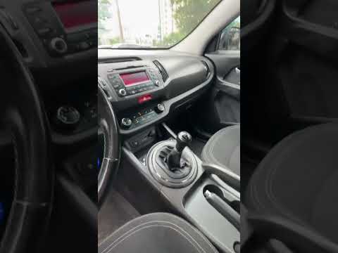 фото kia sportage iii 0