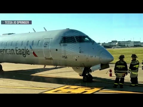 Oxygen masks drop during mid-air flight emergency