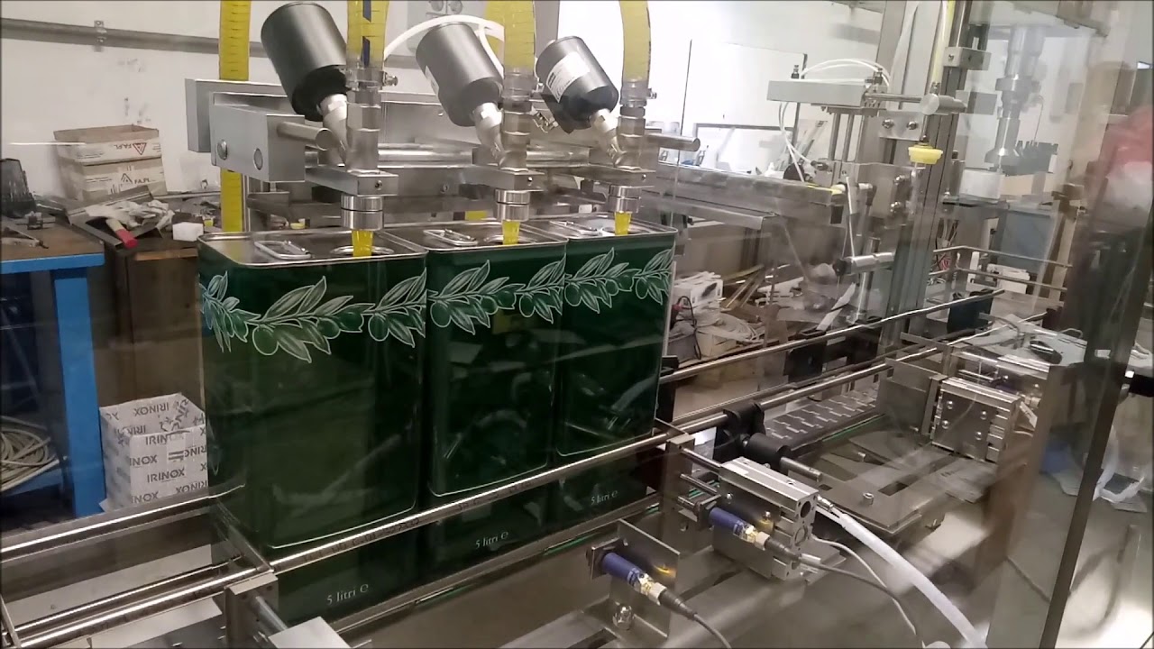 Riempitrice automatica per lattine di olio Olitec BLT3 - BV AUTOMAZIONI