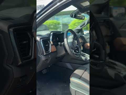 2026 GMC Canyon Crew Cab Short Box 4-Wheel Drive AT4 in Black for sale at Tom Smith Chevrolet Buick GMC Ltd. in Midland, ON
