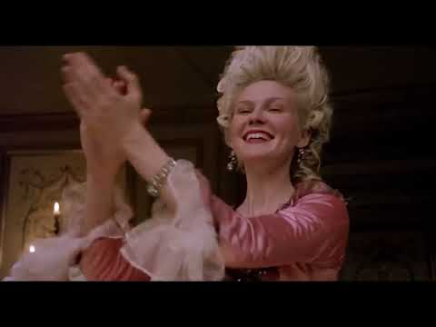 Marie Antoinette 2006 official trailer still with Kirsten Dunst reclining in pastel palace interior