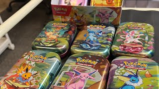 Opening Prismatic Evolution Tins