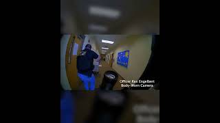 Body cam of police stopping active shooter.