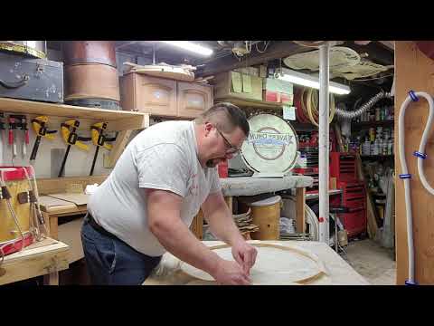 Tucking calfskin drum head