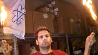 Curt passing fire from torch to torch via his mouth