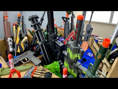 Boxes Of Toy Sniper Rifles, Protective Vests, Ammunition, Toy Guns And Toy Rifles