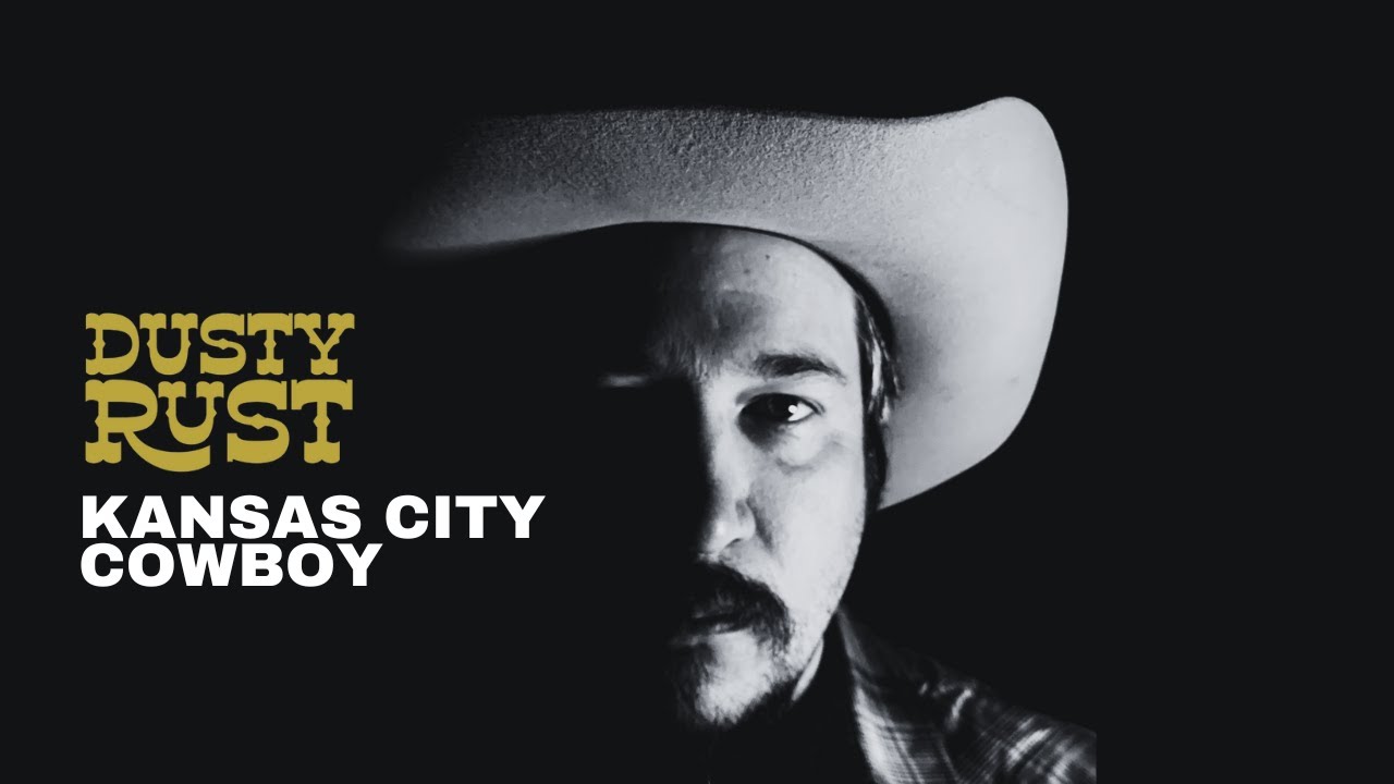 Dusty Rust performing live with guitar