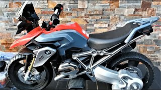 How to Repair a Kids Electric Motor Bike. How to Fix a BMW Electric Motorcycle for Kids.