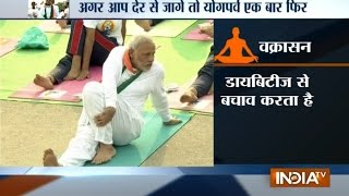 PM Modi performs Vakrasana at Rajpath on international Yoga Day