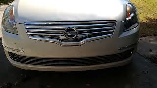 Installing a chrome lower grille overlay on a Nissan Altima